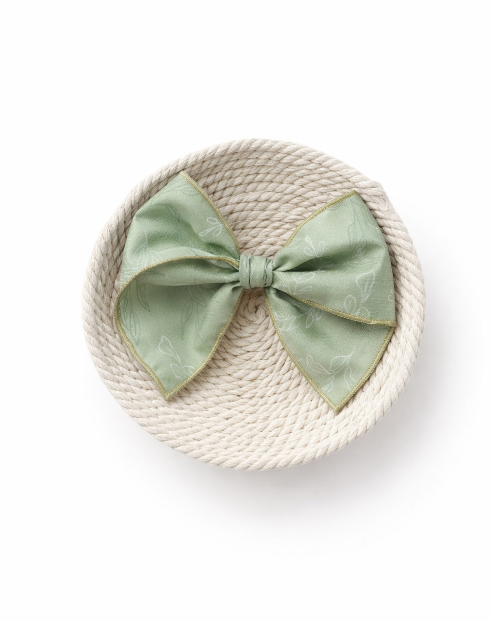 green bow thin pattern Sage green handmade hair bow with subtle floral leaf pattern and rolled edges.