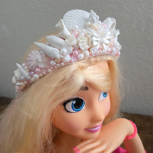 Home Close-up of handmade seashell and pearl headband, delicate mermaid crown detail